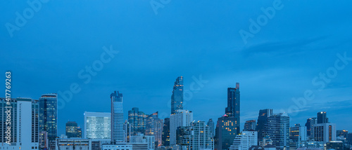 panoramic of Bangkok city skyline at night © tanatat