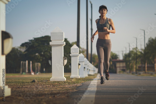 Female in sportwear Running in the park