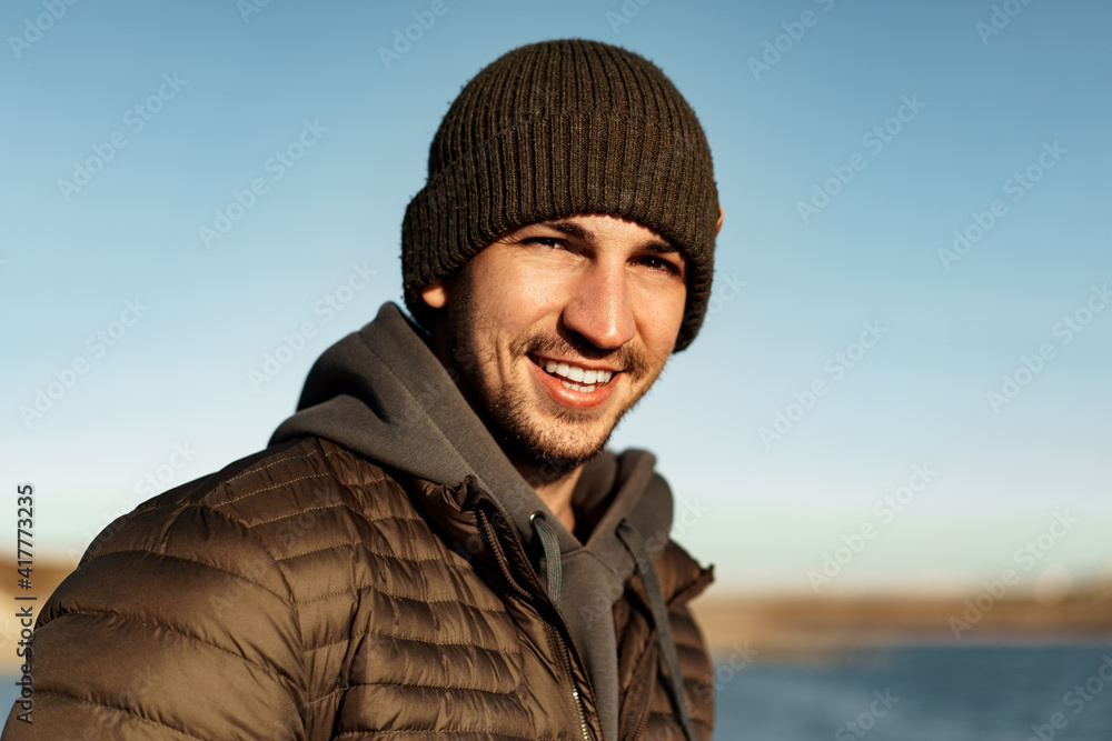 Portrait of a young man in sport trekking outfit standing Portrait of a young man in sport trekking outfit standing