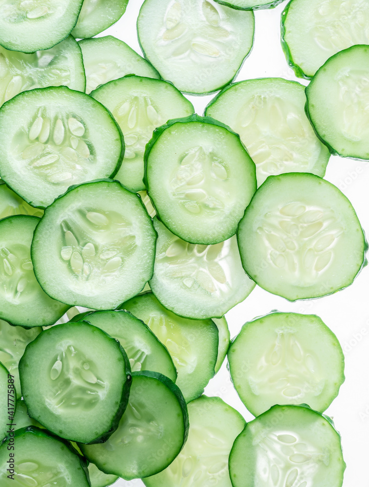 Cucumber slices isolated on the white background. Cucumber slices isolated on the white background.