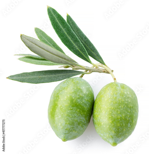 Green natural olives with leaves isolated on a white background.