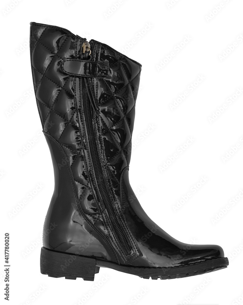 Black varnish female boots on a white background it is isolated.