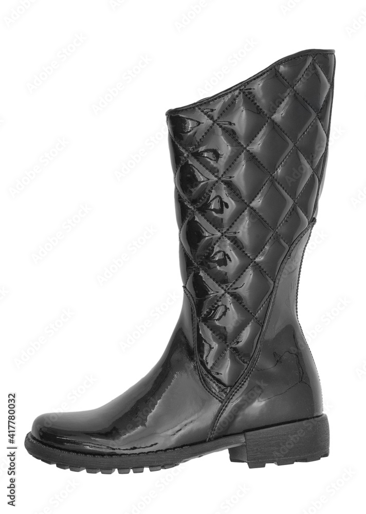 Black varnish female boots on a white background it is isolated.
