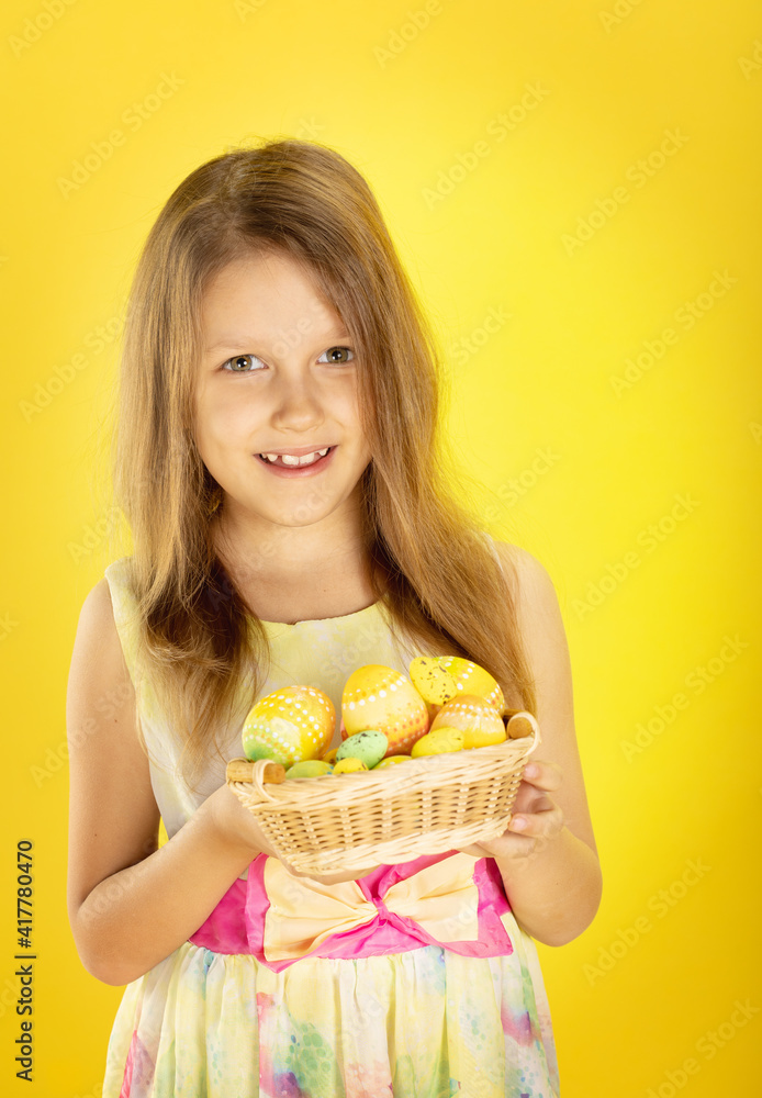 girl with basket of Easter eggs girl with basket of Easter eggs