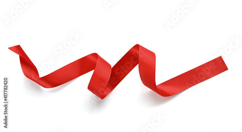 Satin red ribbon on a white background