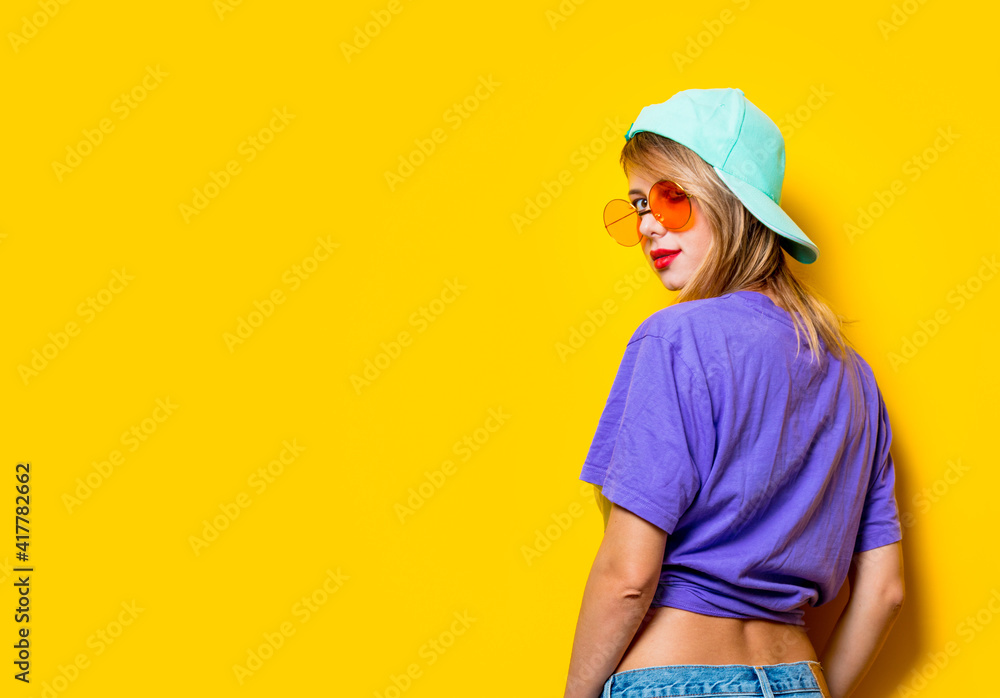 Young style girl with orange glasses and cap Young style girl with orange glasses and cap