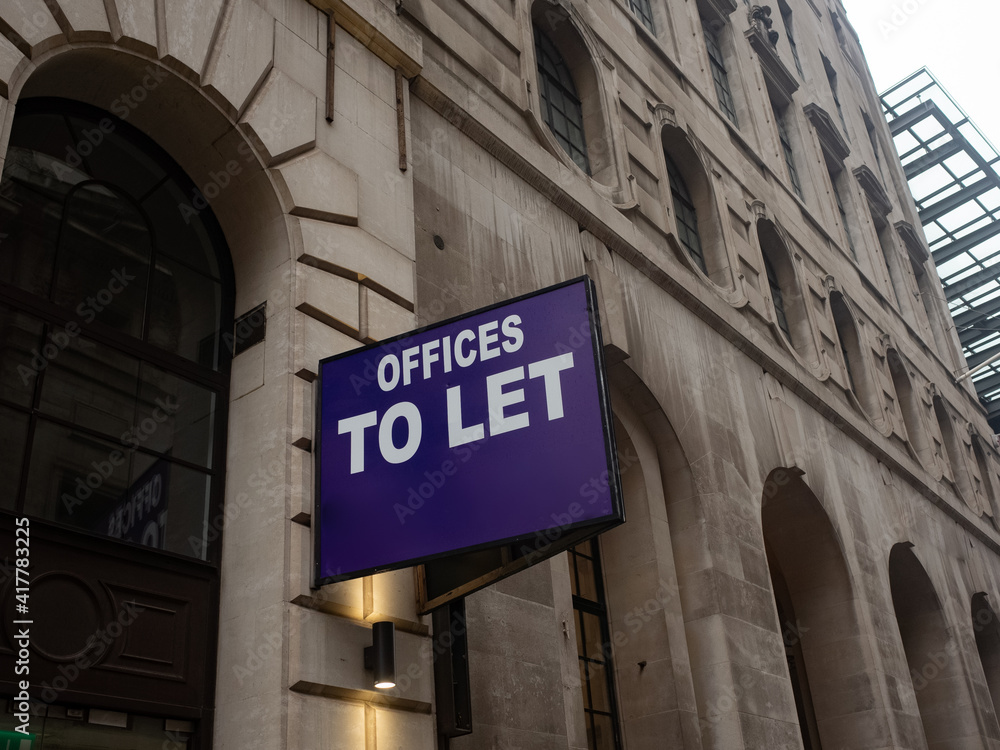 Obraz premium Offices to Let sign in urban city area