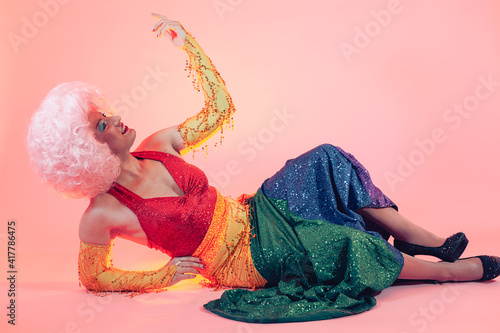 Fotografie studio portrait of a drag queen on pink background
