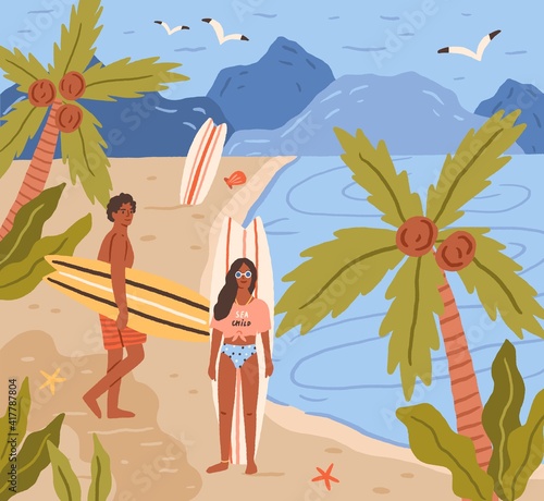 Happy young people with surfboards on tropical beach in summer. Smiling surfe...