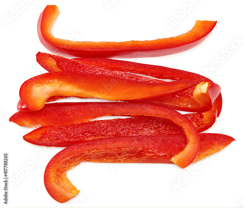 sliced red sweet bell pepper isolated on white background. clipping path. top view