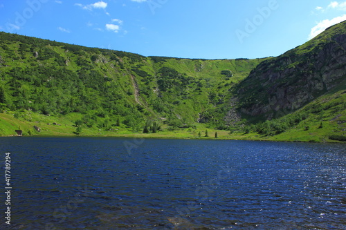 Beautiful view with blue lake and green mountains
