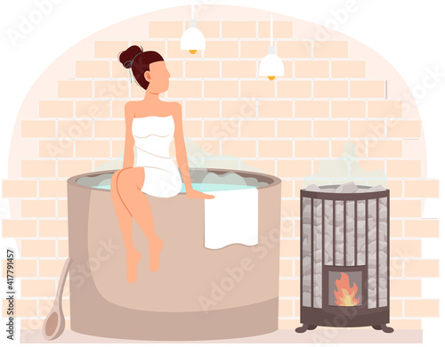 Young woman sitting on tub. Bathhouse or banya at home interior design. Girl on barrel wrapped in towel is resting in sauna. Female character in hot steam. Container with water heated by fire device