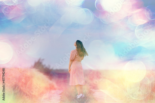 nature summer field portrait girl full growth against the backdrop of a landscape on a summer day