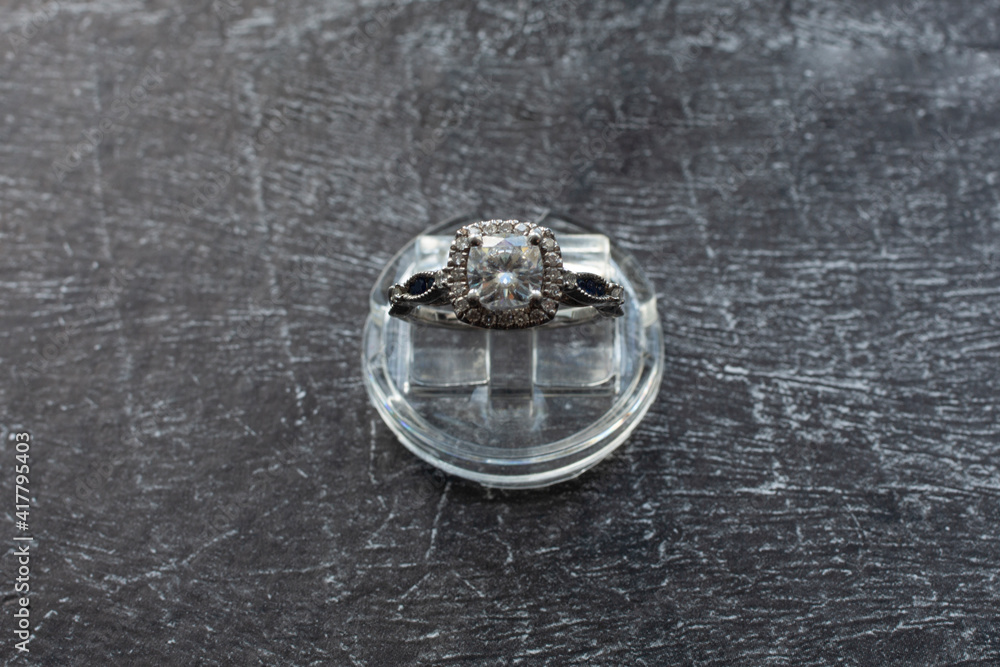 Diamond Ring, Gold ring with natural diamonds on a dark background Diamond Ring, Gold ring with natural diamonds on a dark background