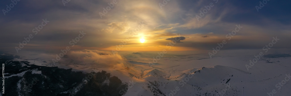 beautiful winter landscape in golden sunset light, Dobrogea, Romania