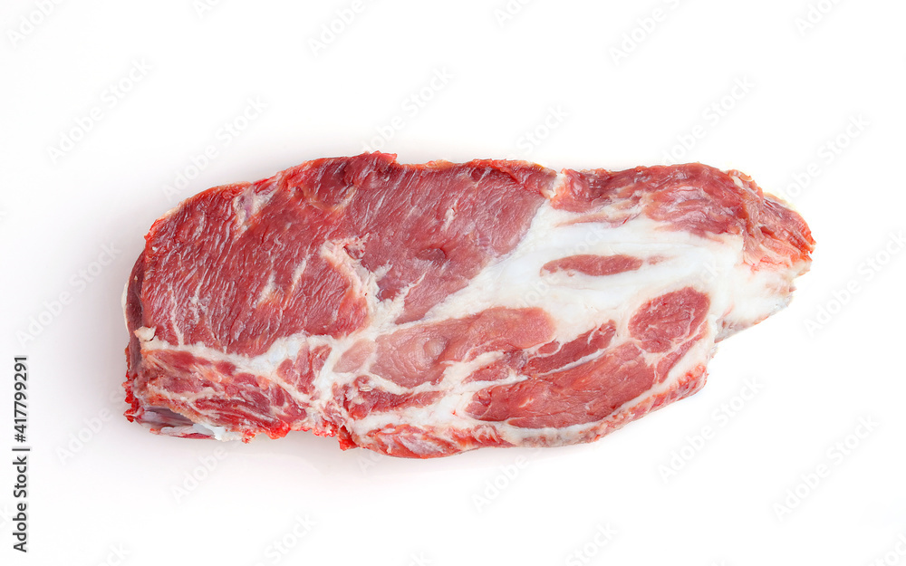 A piece of fresh raw pork for cooking a steak.