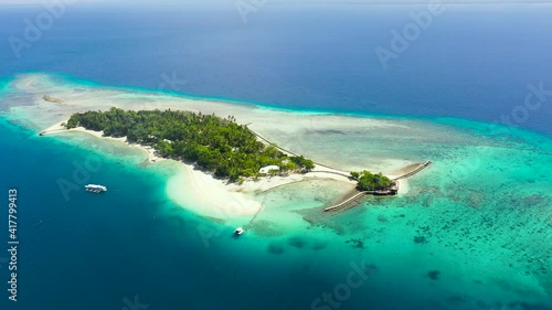 Wallpaper Mural Little Liguid Island with a sandy beach and azure water surrounded by a coral reef and an atoll, aerial view. Little Cruz Island, Philippines, Samal. Torontodigital.ca