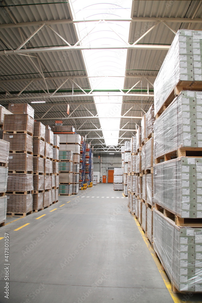 Industrial equipment for the production of laminate. Furniture factory production line. Laminated flooring. The factory for the production of laminate. Industrial equipment for the production of laminate. Furniture factory production line. Laminated flooring. The factory for the production of laminate.