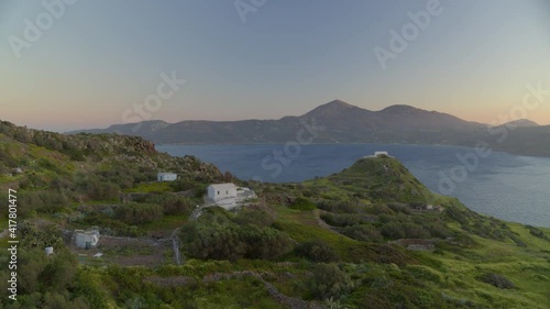 Rural House Along Hillside in the Island of Milos at Sunset photo