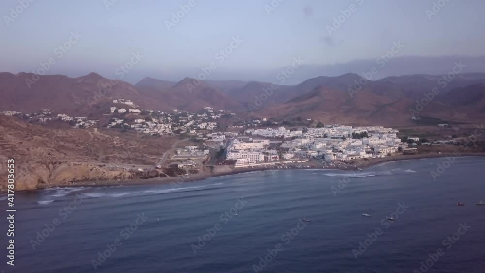 Aerial view Mediterranean Playa Negras coastline town Spain landscape travel destination dolly right Aerial view Mediterranean Playa Negras coastline town Spain landscape travel destination dolly right