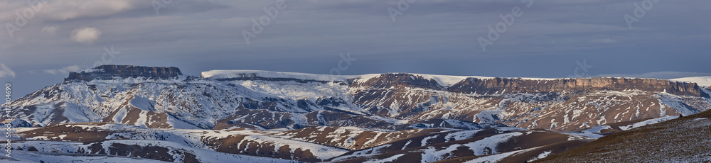 Panorama of the winter Bermamyt Plateau part of the Rocky Ridge of the Greater Caucasus