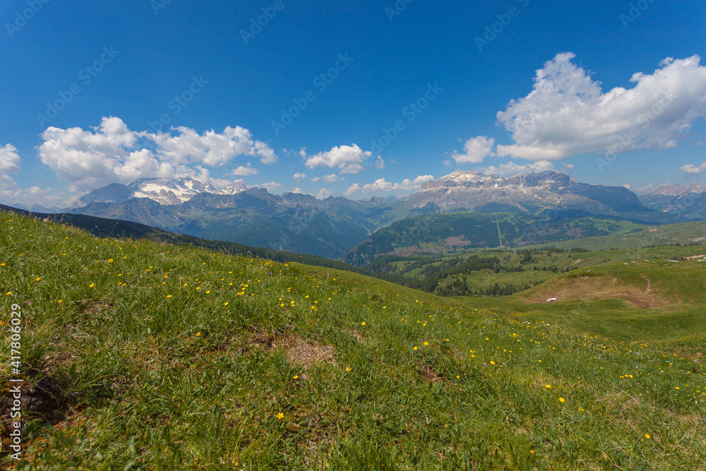 Magnificent summer dolomite panorama of Marmolada and Sella Massif, Dolomites, Italy