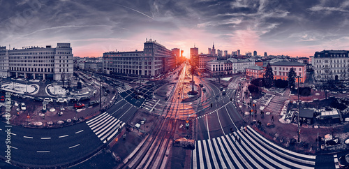 Beautiful panoramic aerial sunset drone skyline view of the Warsaw City Centre with skyscrapers of the Warsaw City Centre and artificial palm, Poland, EU