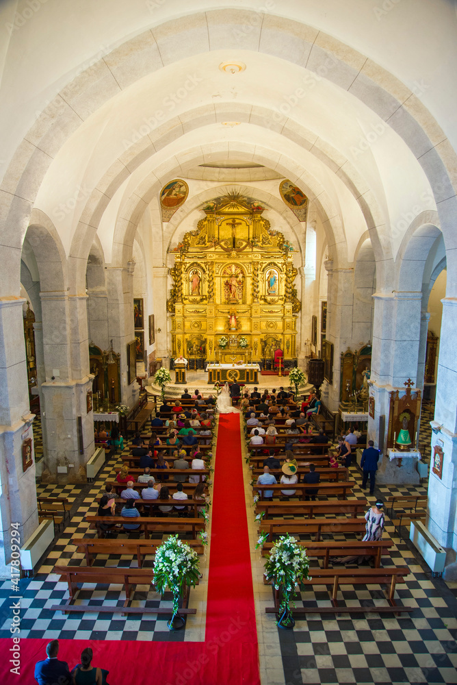 Fototapeta premium CHURCH INTERIOR DURING A WEDDING CELEBRATION