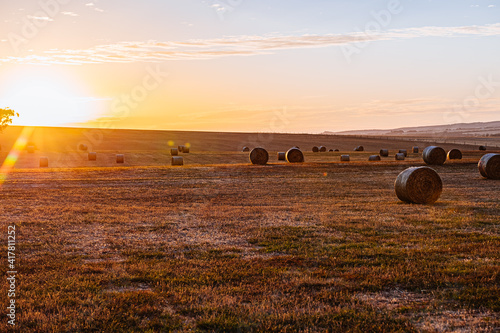 A golden sunset spreads across a farm in Waitpinga, South Australia. photo