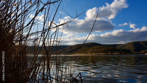 Ankara Eymir lake and its surroundings. Cormorants. Reeds. Reflections in the water. photo