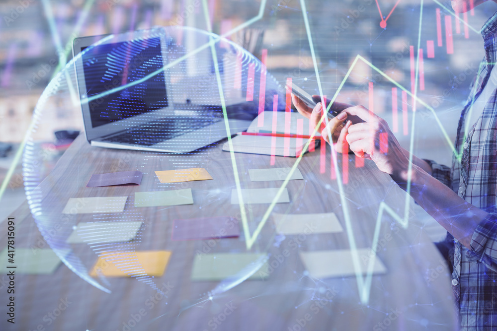Double exposure of woman hands working on computer and forex graph hologram drawing. Financial analysis concept. Double exposure of woman hands working on computer and forex graph hologram drawing. Financial analysis concept.