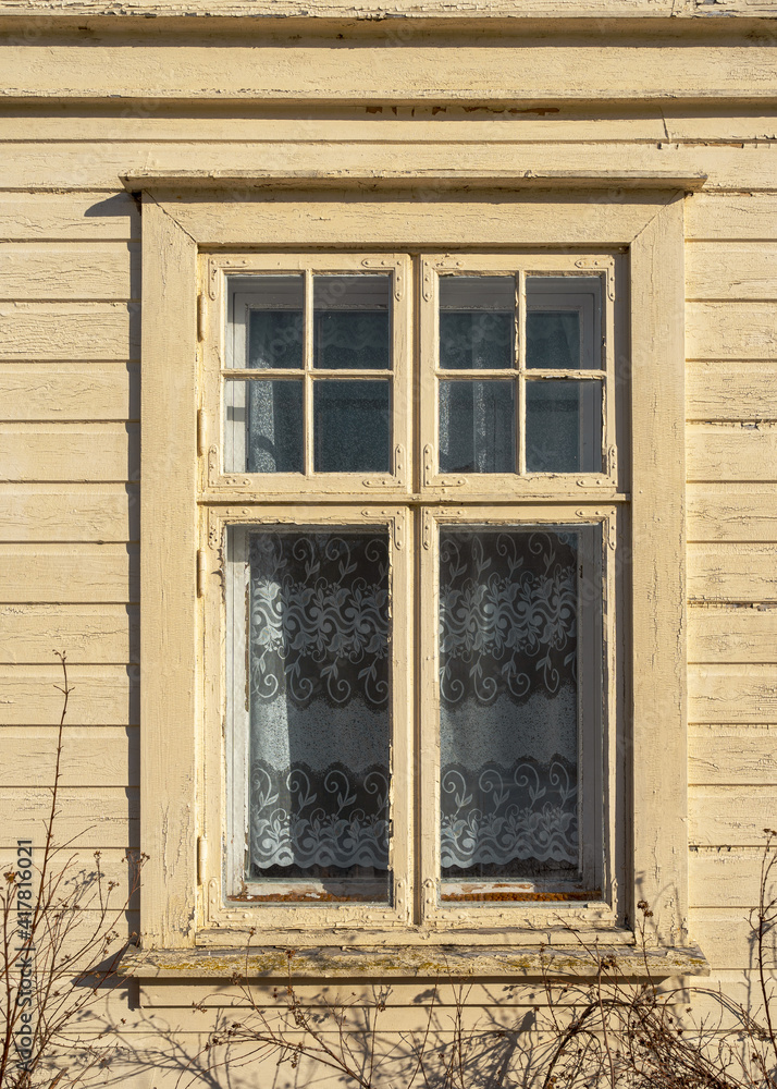 Fototapeta premium Jugend window of abandoned wooden house.
