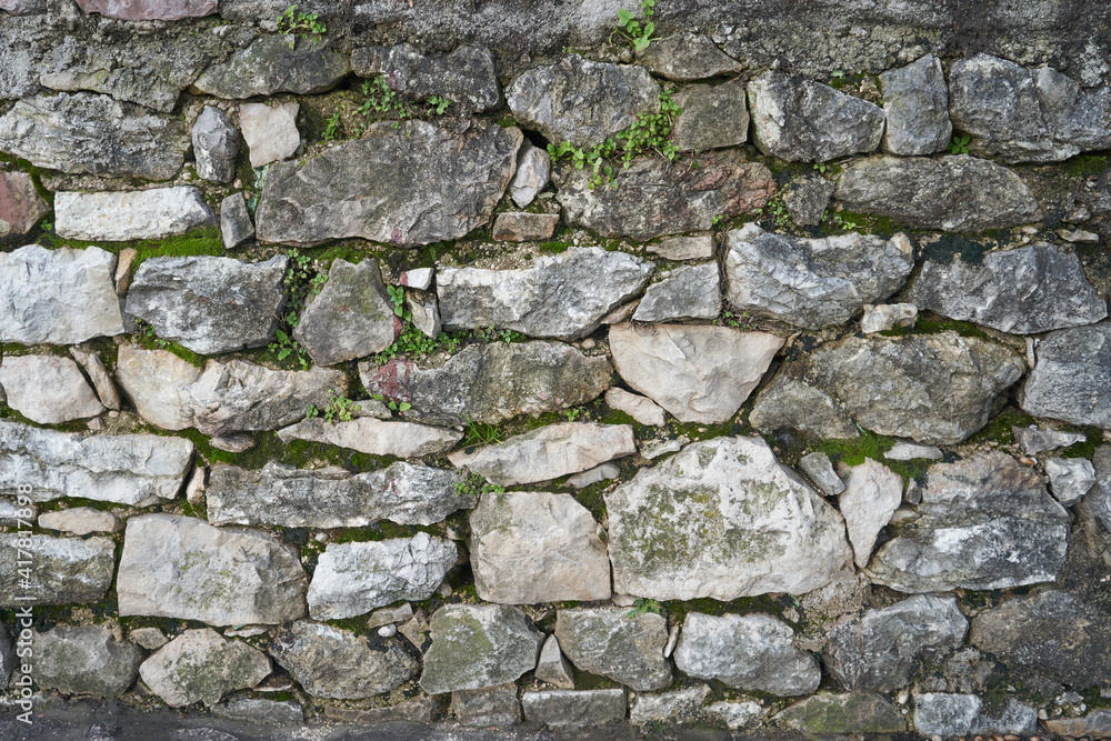 Natural stones wall. Natural pattern. Natural light. High quality photo Natural stones wall. Natural pattern. Natural light. High quality photo