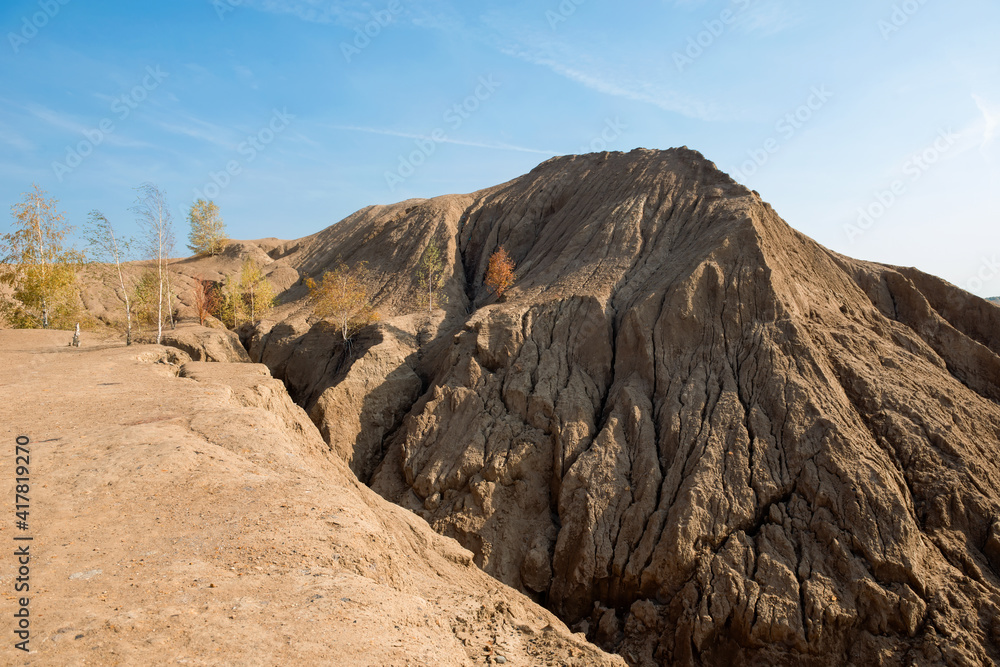 Konduki, Tula region, Romancevskie mountains, Abandoned Ushakov quarries. The mud erosion of the soil looks like mountains. The area is overgrown with young birches. Beautiful natural landscape