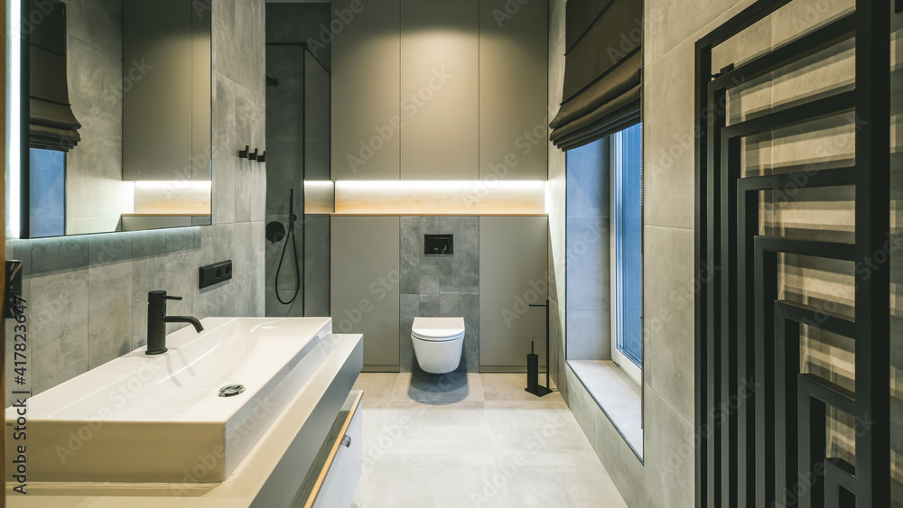 Modern interior in grey tones of bathroom in luxury apartment. Modern interior in grey tones of bathroom in luxury apartment.