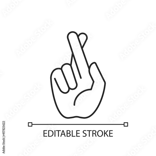 Crossed fingers linear icon. Hand gesture used to wish for luck. Keep your fingers crossed. Thin line customizable illustration. Contour symbol. Vector isolated outline drawing. Editable stroke