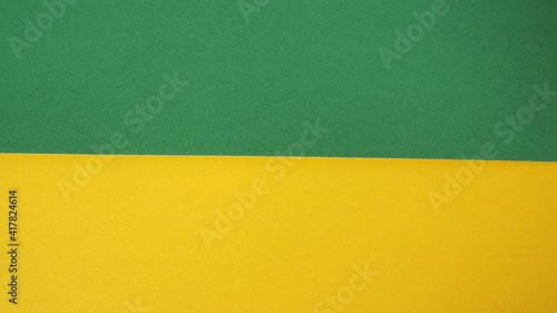 Yellow color and green color paper for background.