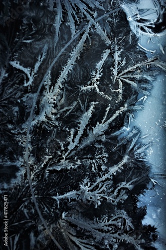 frosty patterns on dark glass