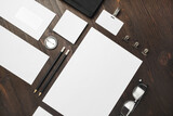 Blank corporate stationery set on wooden background. Template for branding design. Branding mock up. Top view. Flat lay.