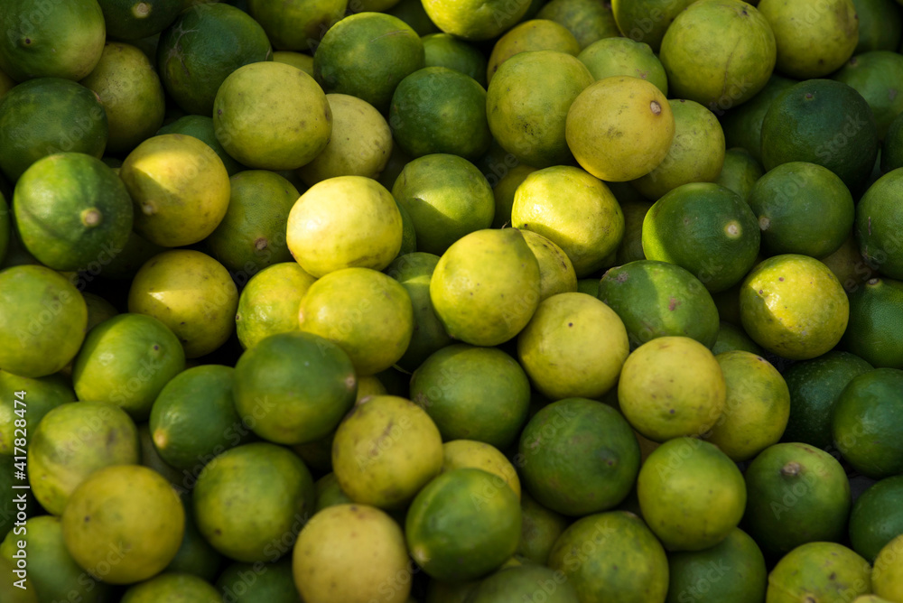 Varanasi / India 27 March 2018 Indian lemons for sale at a market in Varanasi  Uttar Pradesh India