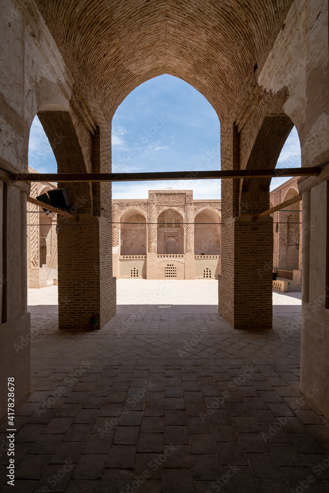 Yazd, Iran - 13.04.2019: Courtyard of the historical Jameh Mosque of Naein, Yazd province, Iran. Very old islamic architecture.