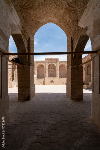 Yazd, Iran - 13.04.2019: Courtyard of the historical Jameh Mosque of Naein, Yazd province, Iran. Very old islamic architecture.
