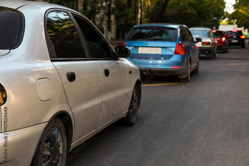 Cars in traffic jam on city street