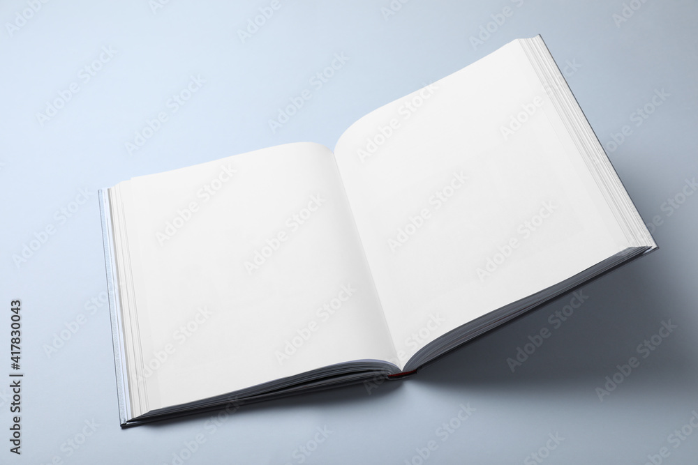 Open book with hard cover on white background Open book with hard cover on white background