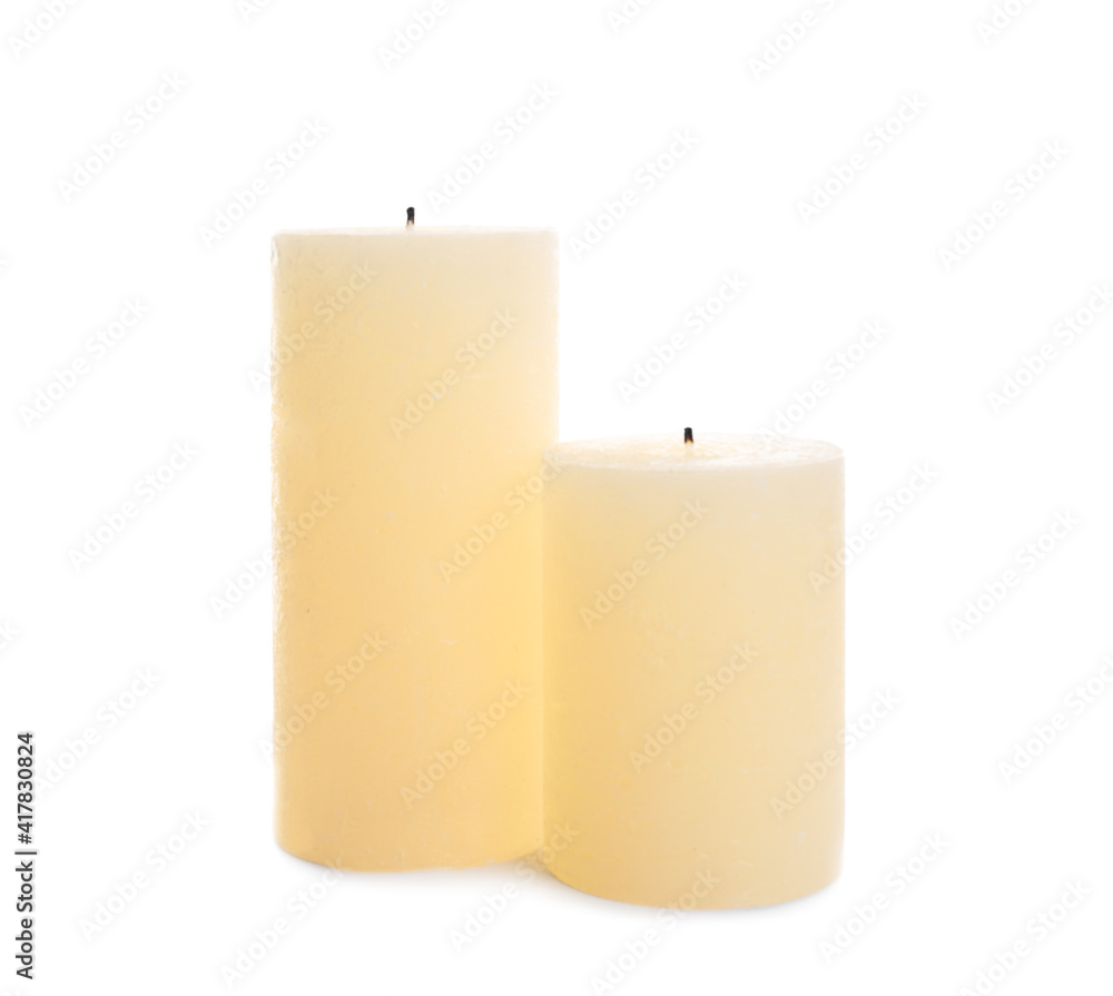 New pillar wax candles on white background New pillar wax candles on white background