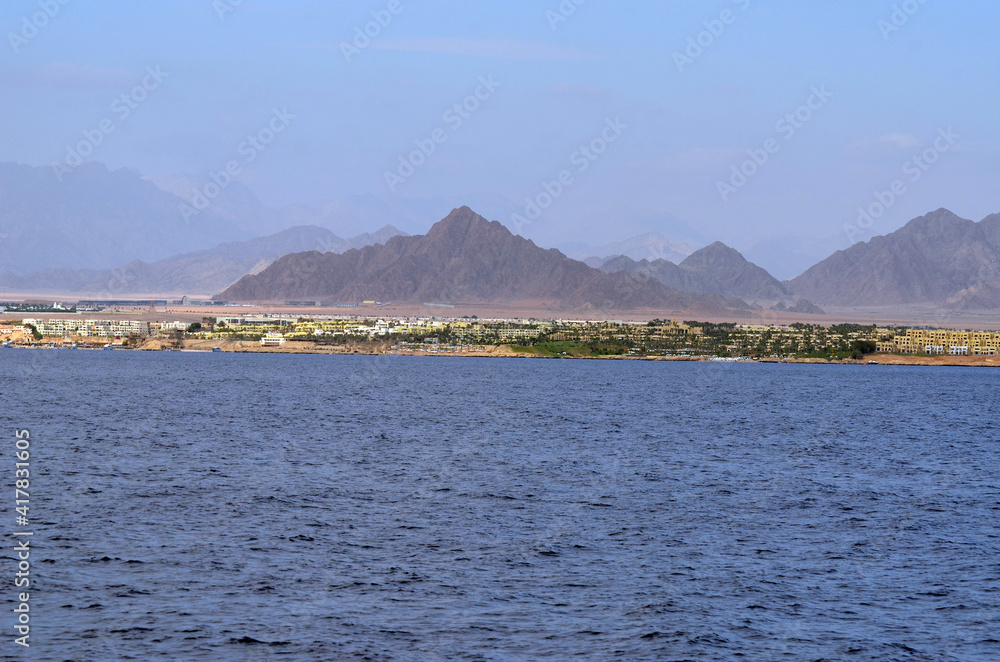 Resorts and hotels at coast of Sharm El Sheikh from yacht. Egypt 