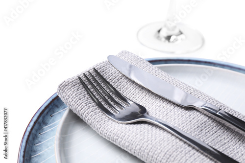 Elegant table setting on white background, closeup