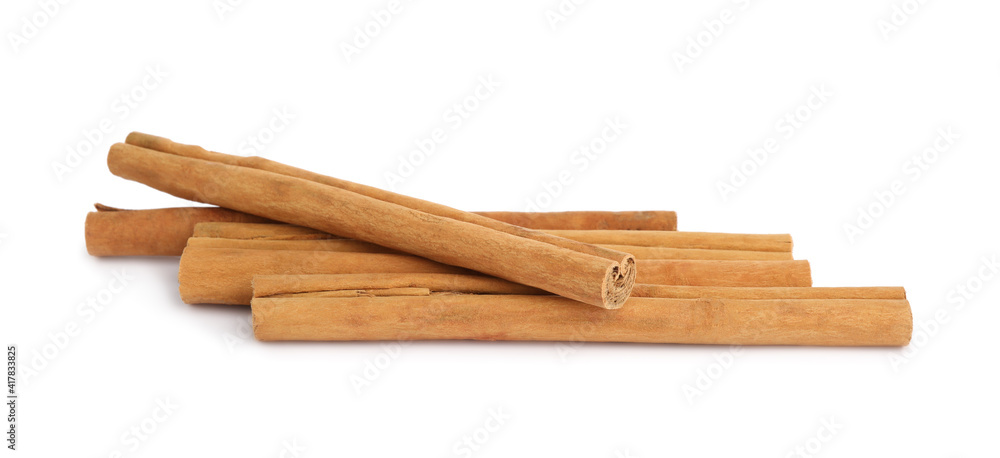 Aromatic dry cinnamon sticks on white background Aromatic dry cinnamon sticks on white background