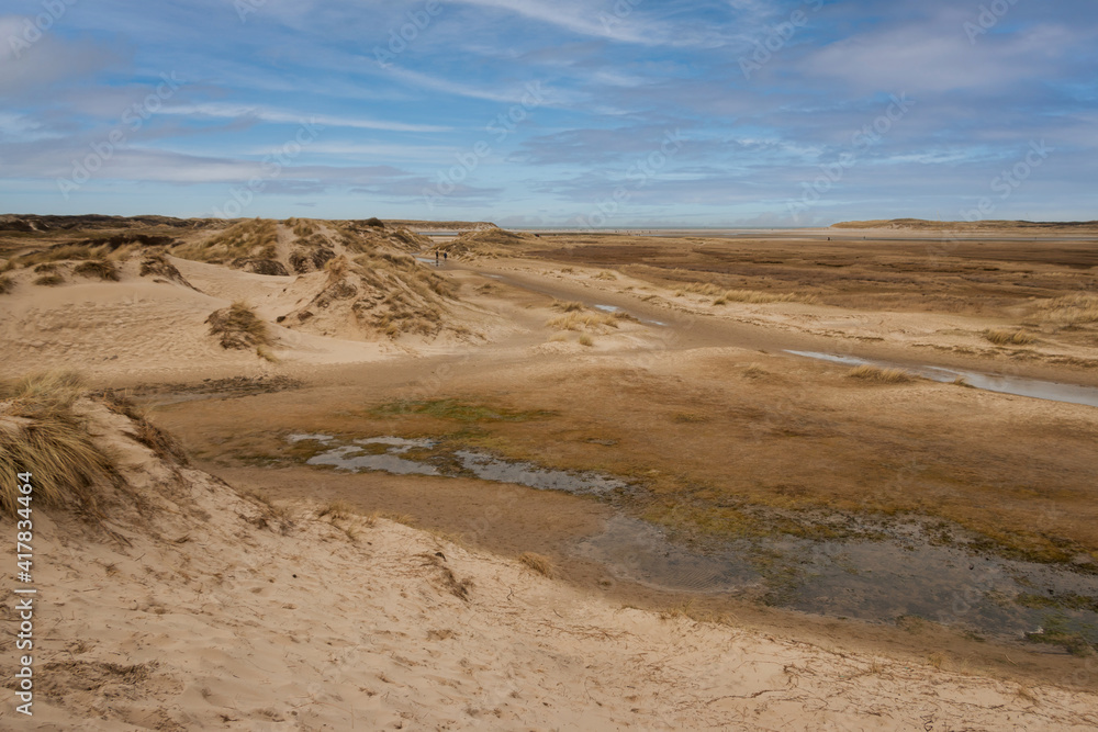 Walking through the slufter valley on the Wadden island of Texel, a sandy plain that is openly connected to the North Sea, the Netherlands