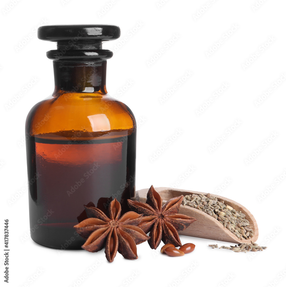 Anise essential oil and spice on white background Anise essential oil and spice on white background